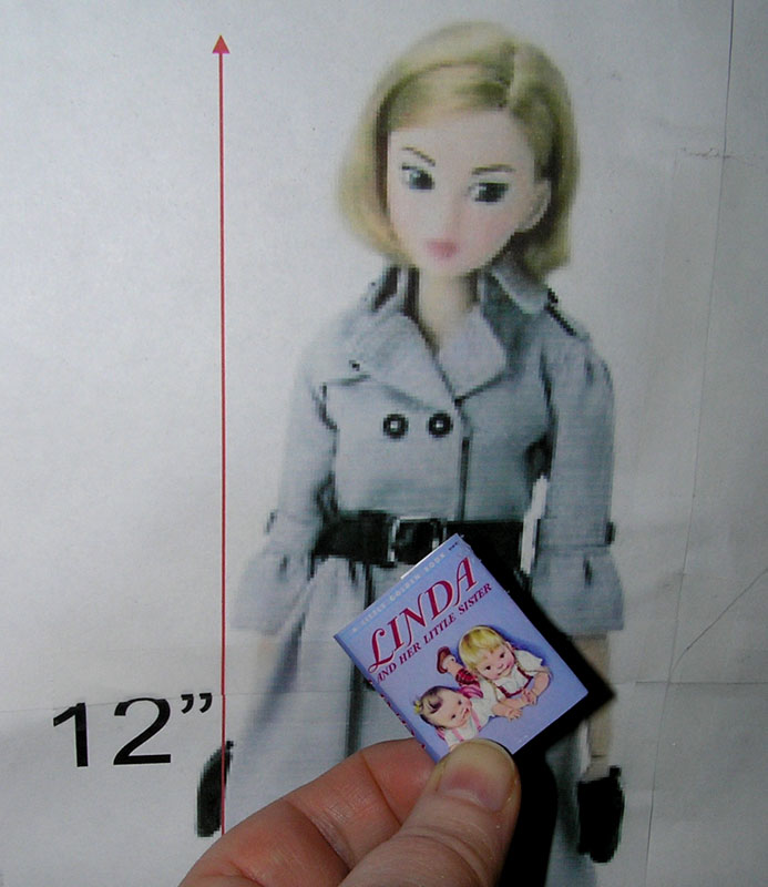 12in fashion doll and large Eloise Wilkin book
